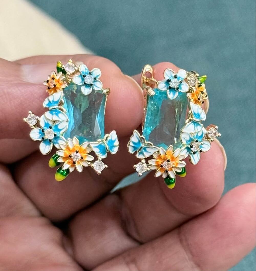 Gold Tone Blue Crystal Floral Statement Earrings with CZ Accents